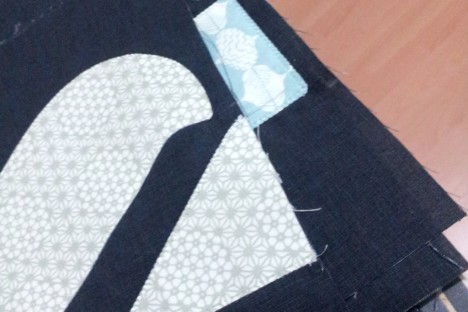 An image of the applique extending into the seam allowance