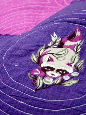 Thorny Patchwork raccoon embroidery detail